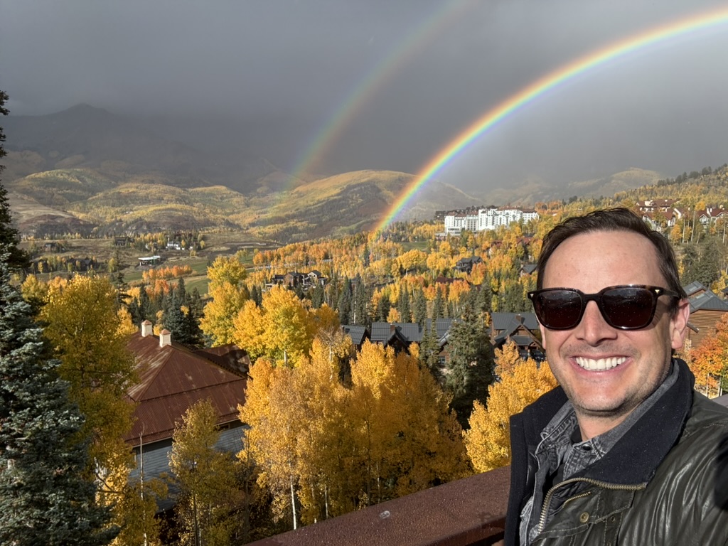 Double rainbow over Mountain Village in autumn